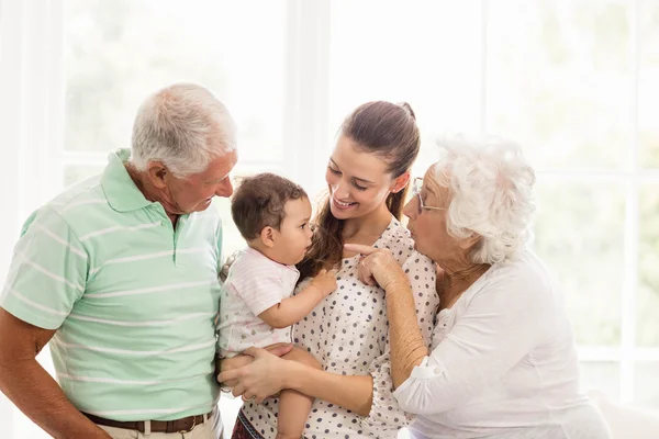 Abuelos jugando con su nieto —  Fotos de Stock