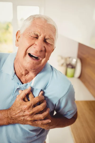 Painful senior man with pain on heart — Stock Photo, Image