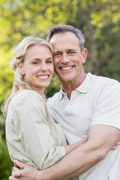 Cute couple hugging with arms around — Stock Photo, Image