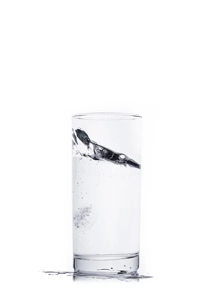 Com salpicos em um copo — Fotografia de Stock