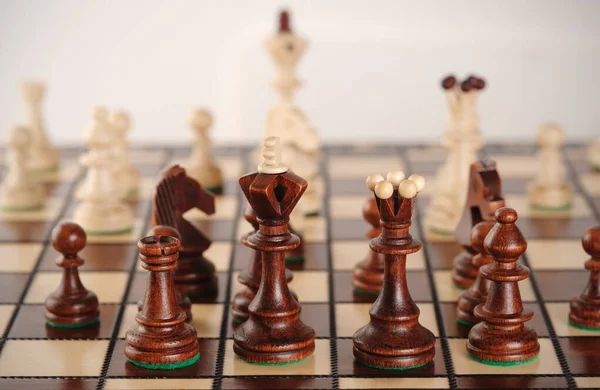 Chess game with board and figures .Game for ideas and competition. Selective focus.