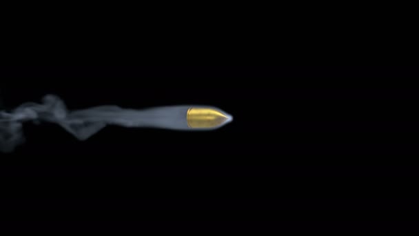 Компьютерное изображение летающей пули на черном фоне — стоковое видео