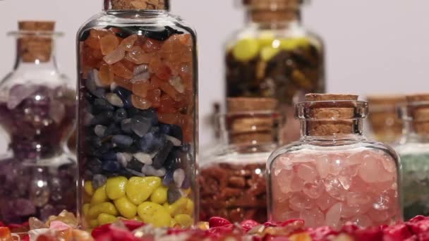 Rotating mini gemstone bottles — Stock Video