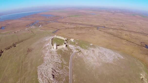 The ruins of medieval fortress Yeni-Sale (aerial view) in Dobrogea, Romania — Stock Video