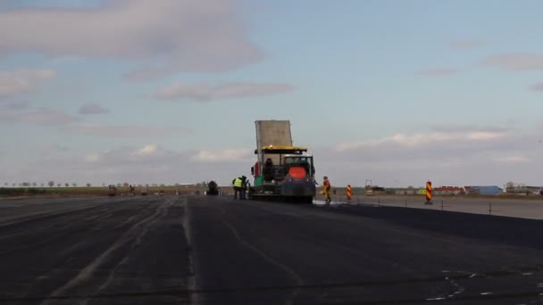 Road rollers leveling fresh asphalt pavement, time lapse — Stock Video