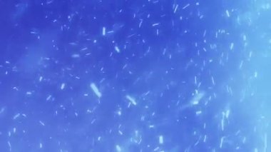 Mavi bir arka plan üzerinde gerçekçi kar yağışı