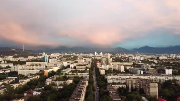Bright color sunset over the city of Almaty. — Stock Video