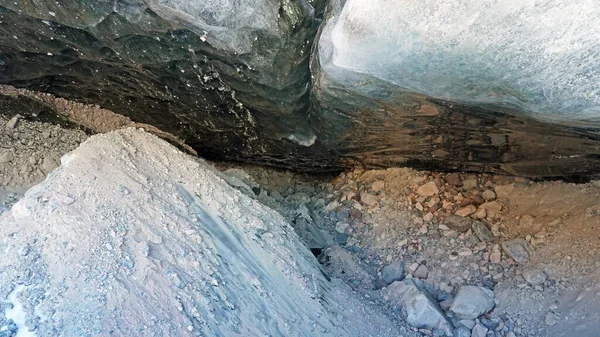 Ice cave in the snowy mountains. Tuyuk-Su glacier