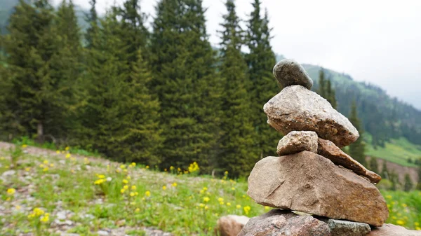 Pile of stones in the mountains - tour. — Stock Photo, Image