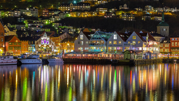 Bergen, Norway- 12 December 2015: View of the main square Torgallmenningen in th city at night. Beautiful illumination.