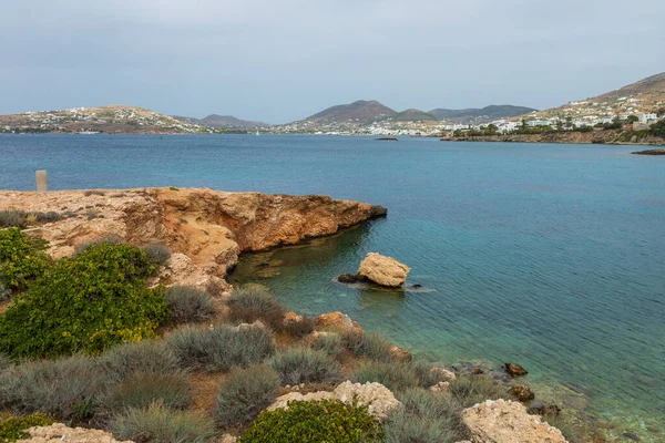 Rocky, Aegean coast on the west side of the Paros Island. Hills around. Greece.