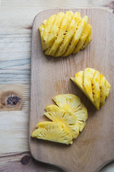 Pineapple slices on the wooden — Stock Photo, Image