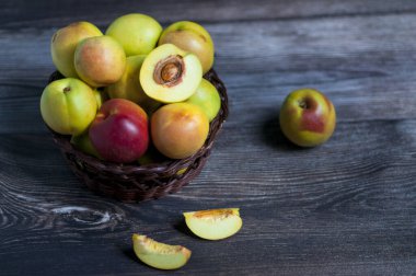 delicious fresh peaches on the rustic wooden table