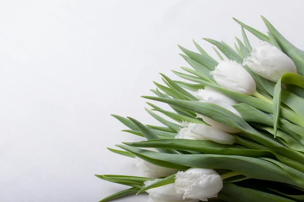 Bunch of spring tulips on the table — Stock Photo, Image