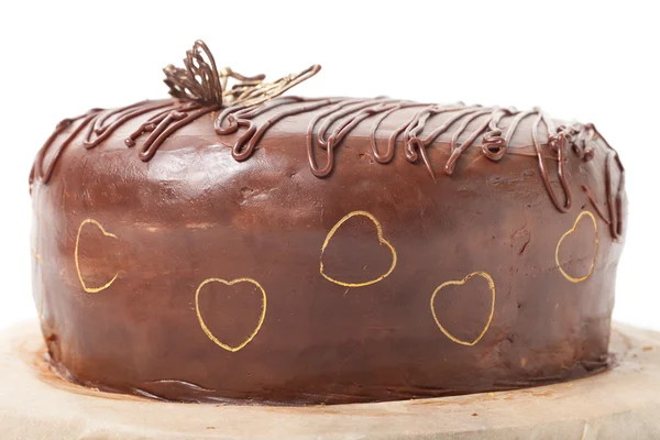Domácí čokoládový dort s zlatým dekorem. Zblízka — Stock fotografie