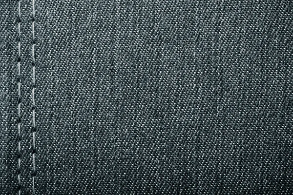 Surface de tissu de jeans pour fond texturé. tonique — Photo