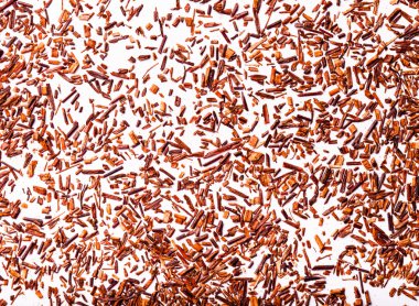 Doku için arka plan olarak kuru rooibos çay yaprakları. Tonda