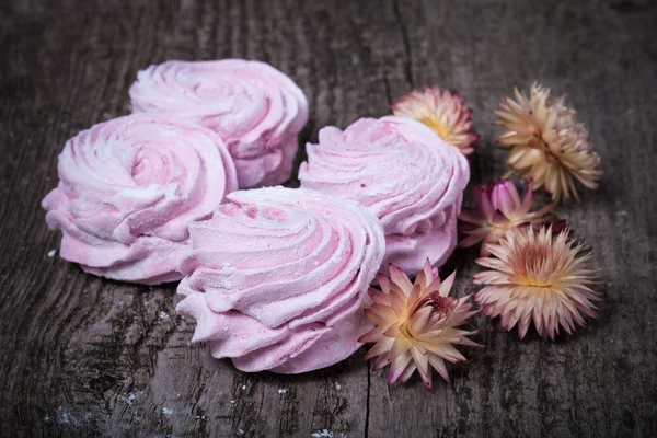 Fresh pink homemade zephyr - marshmallow on old wooden table. Sh — Stock Photo, Image