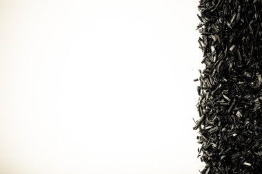 Doku için arka plan olarak kuru rooibos çay yaprakları. Tonda