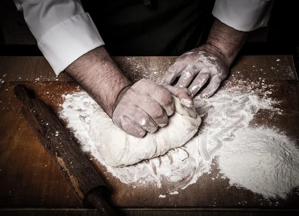 The process of making home bread by male hands. Toned — Stock Photo, Image