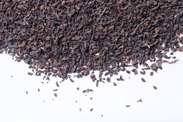Feuilles de thé noir sèches comme texture de fond — Photo