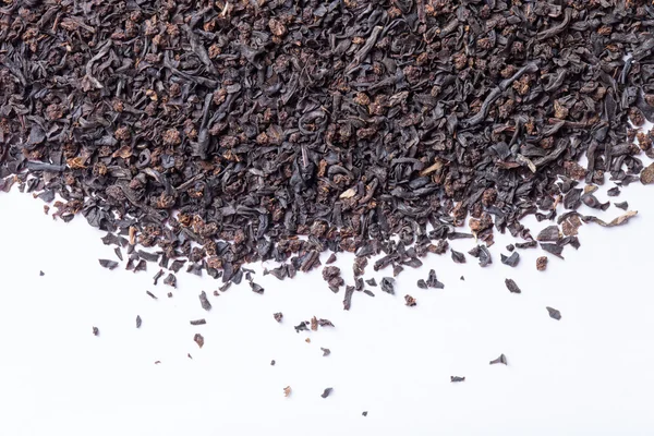 Hojas de té negro seco como textura para el fondo — Foto de Stock