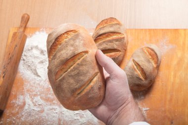 The process of making home bread by male hands clipart