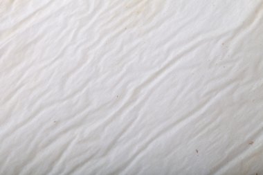 Textured surface of old baking paper clipart