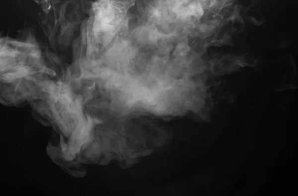 Nuvem de fumo no fundo preto. Foco seletivo — Fotografia de Stock