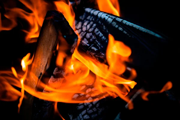 Bright flame of bonfire. Defocused. Toned — Stock Photo, Image