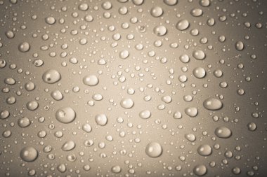 bir renk arka plan üzerinde Su damlacıkları. gri. sığ derinliği bes