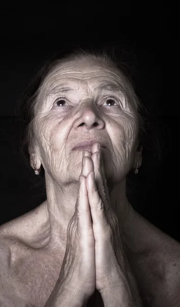 Retrato de mulher idosa. Oração. Tonificado — Fotografia de Stock