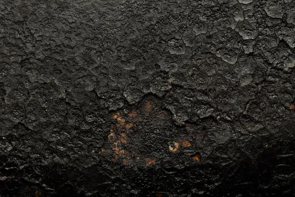 Black old metal background. The surface of the pan. Toned — Stock Photo, Image