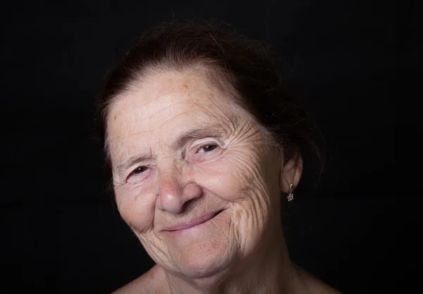 Portret van oudere vrouw. Glimlach — Stockfoto