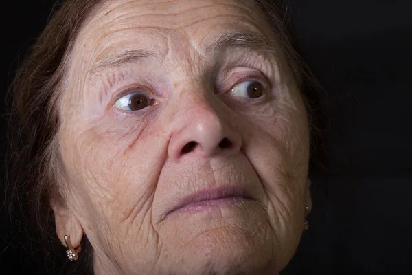 Portrait of elderly woman. Wonderment — Stock Photo, Image