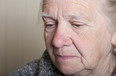 Portrait of an elderly woman. Closeup view clipart