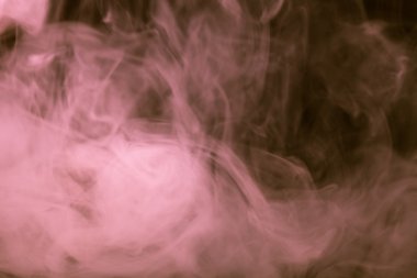 Bir siyah arka plan üzerinde duman bulutu. Seçici odak. Tonda