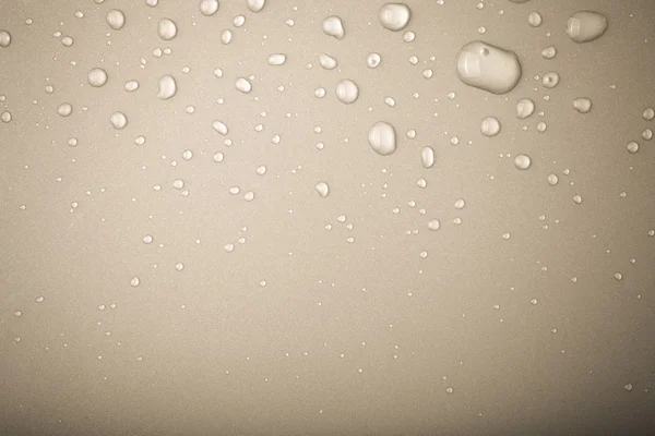 Gotas de água em um fundo a cores. Cinza. Tonificado — Fotografia de Stock