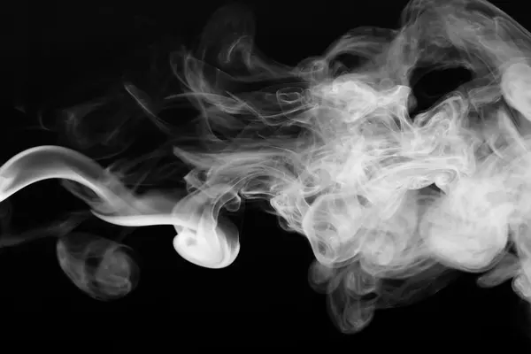 Cloud of smoke on black background. Selective focus — Stock Photo, Image