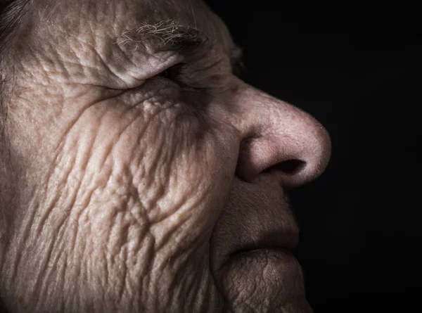 Portrait of elderly woman. Dreaminess. Toned — Stock Photo, Image