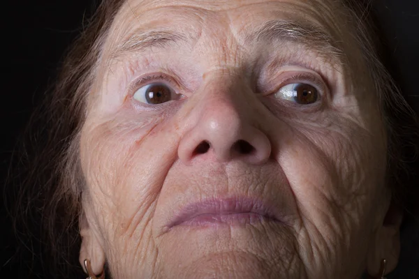 Portrait of elderly woman. Wonderment — Stock Photo, Image