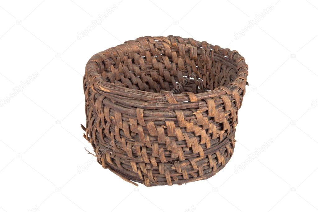 old round wicker willow basket isolated on white background