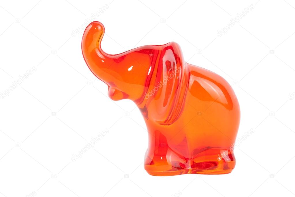 Red elephant made of glass isolated on white background