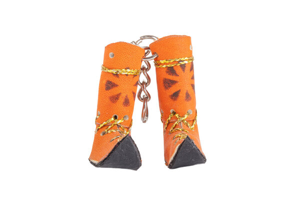 Keychain Yakut boots isolated on white background 