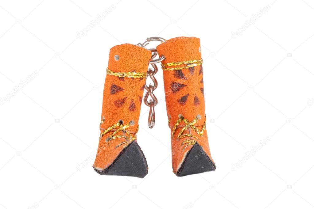 Keychain Yakut boots isolated on white background 