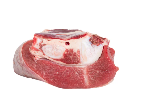 Råt stykke kød isoleret på en hvid baggrund. Langsom dybde - Stock-foto