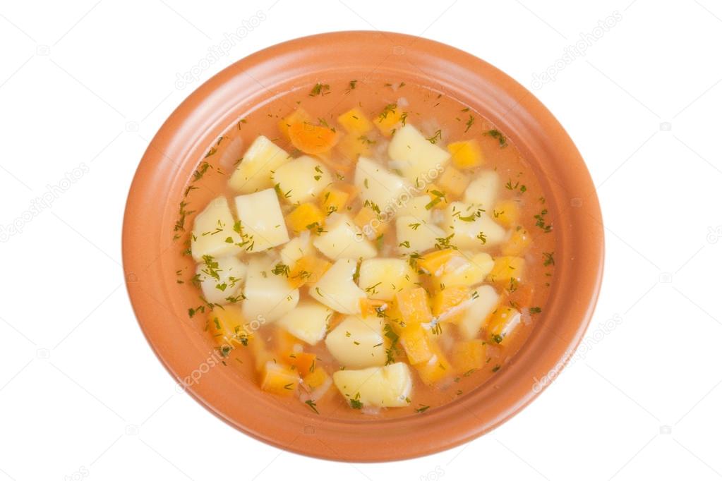 vegetable soup with potatoes isolated on white background.