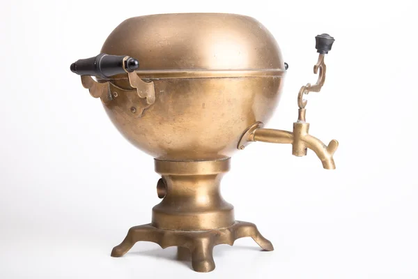 Old brass samovar on a white background — Stock Photo, Image