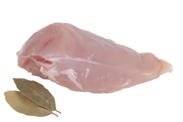 Chicken breast without skin, and two laurel leaves isolated on w — Stock Photo, Image