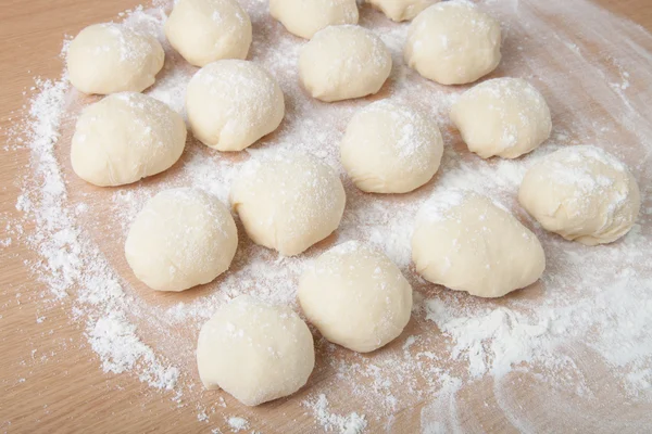 Small balls of dough with flour for pizza or cakes and scones. S — Stock Photo, Image